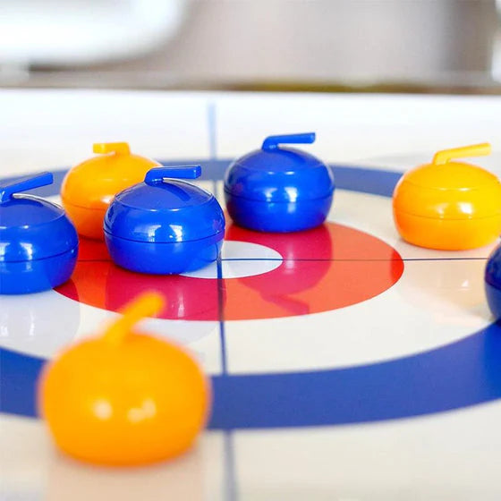 Bordsbaserat curlingspel för hela familjen